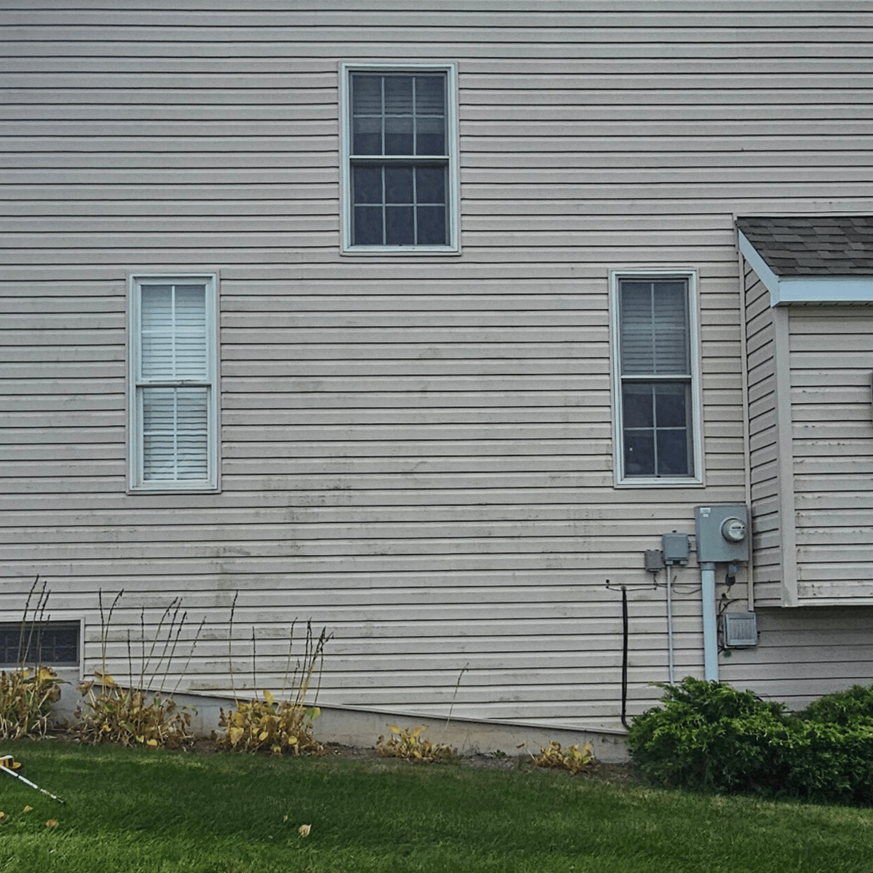 Vinyl siding bright and clean after washing